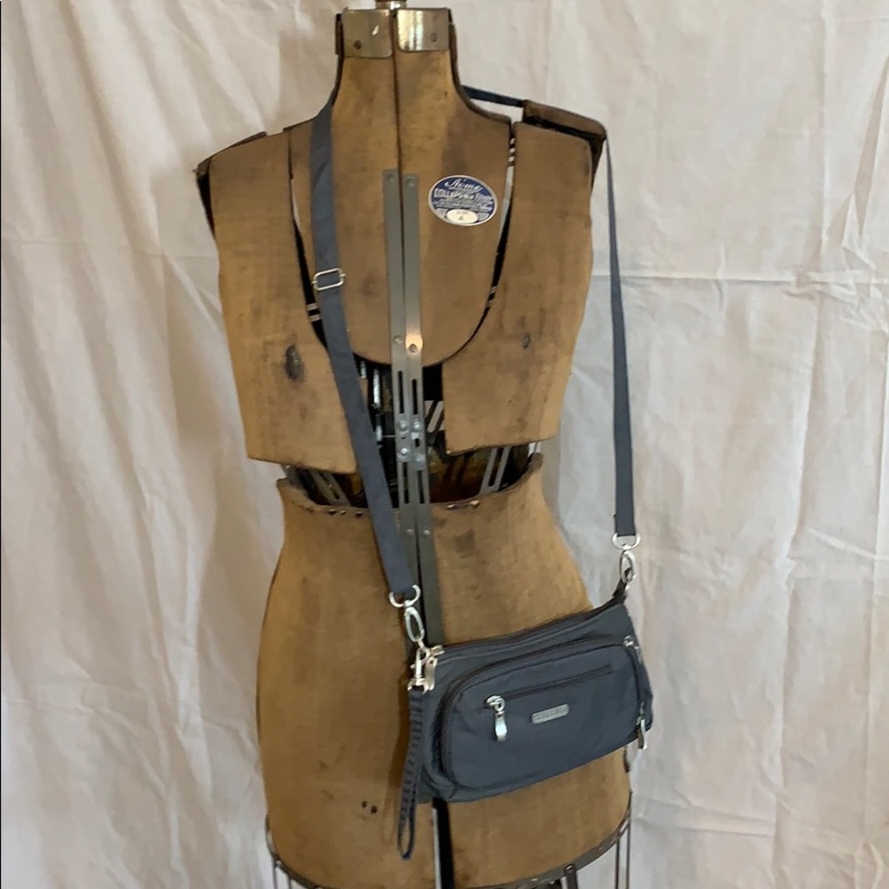 Zip up your life!  Baggallini cross body bag.